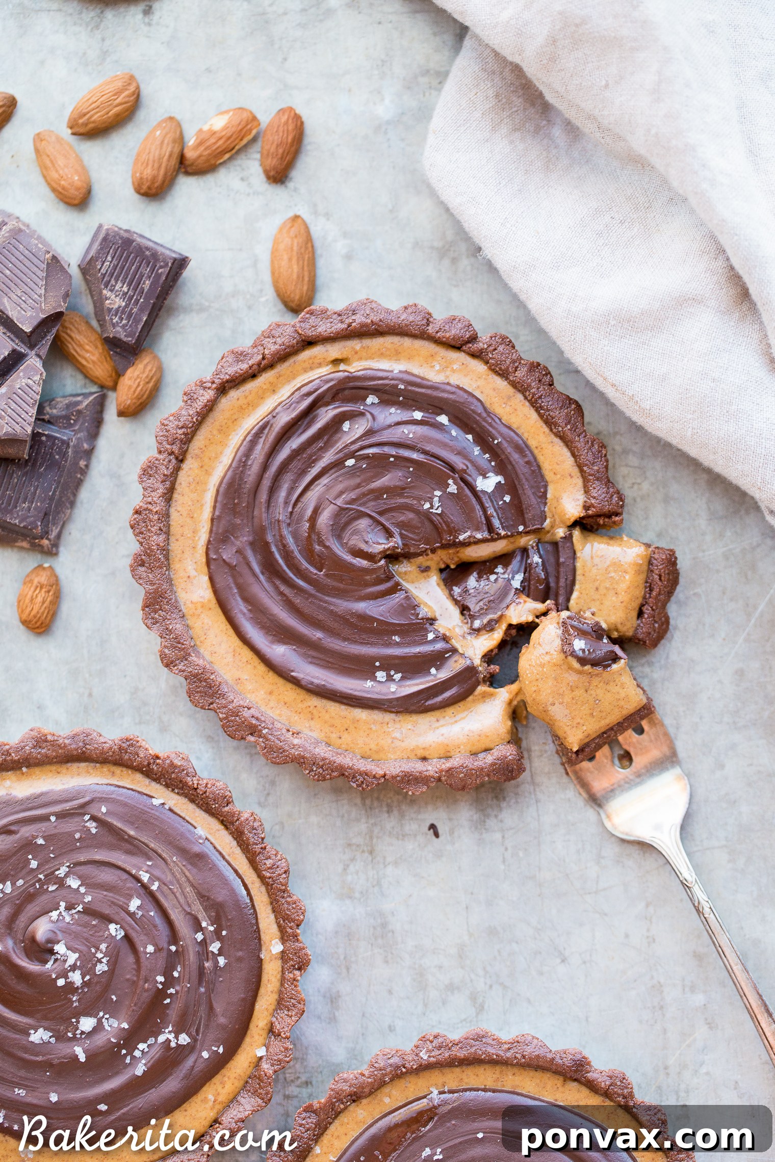 Vegan Chocolate Almond Butter Dream Tart 7 This No Bake Chocolate Almond Butter Tart tastes like a giant almond butter cup! There's no baking required and it's gluten-free, paleo, and vegan. You'll adore this melt in your mouth tart.