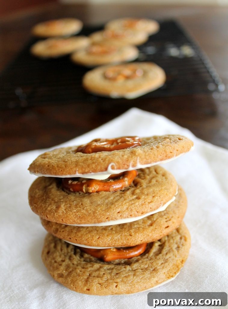 Chewy White Chocolate Pretzel Peanut Butter Cookies on a cooling rack