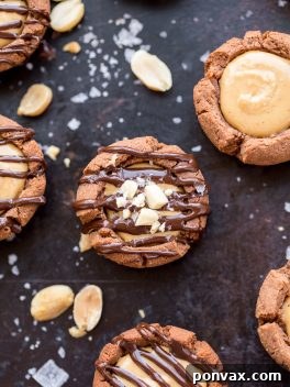 Gluten-Free Vegan Chocolate Peanut Butter Tartlets with crunchy chocolate shortbread crust and creamy peanut butter filling.