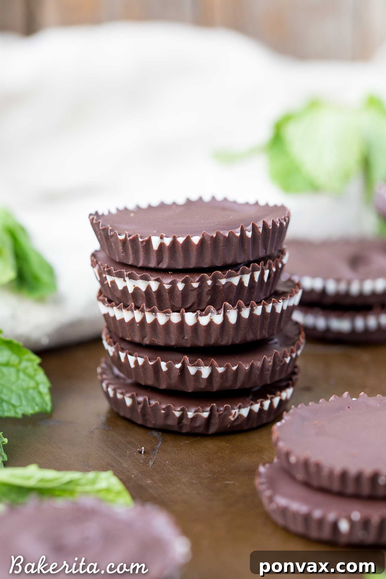 Close-up of a homemade vegan peppermint patty, revealing the smooth coconut butter filling.