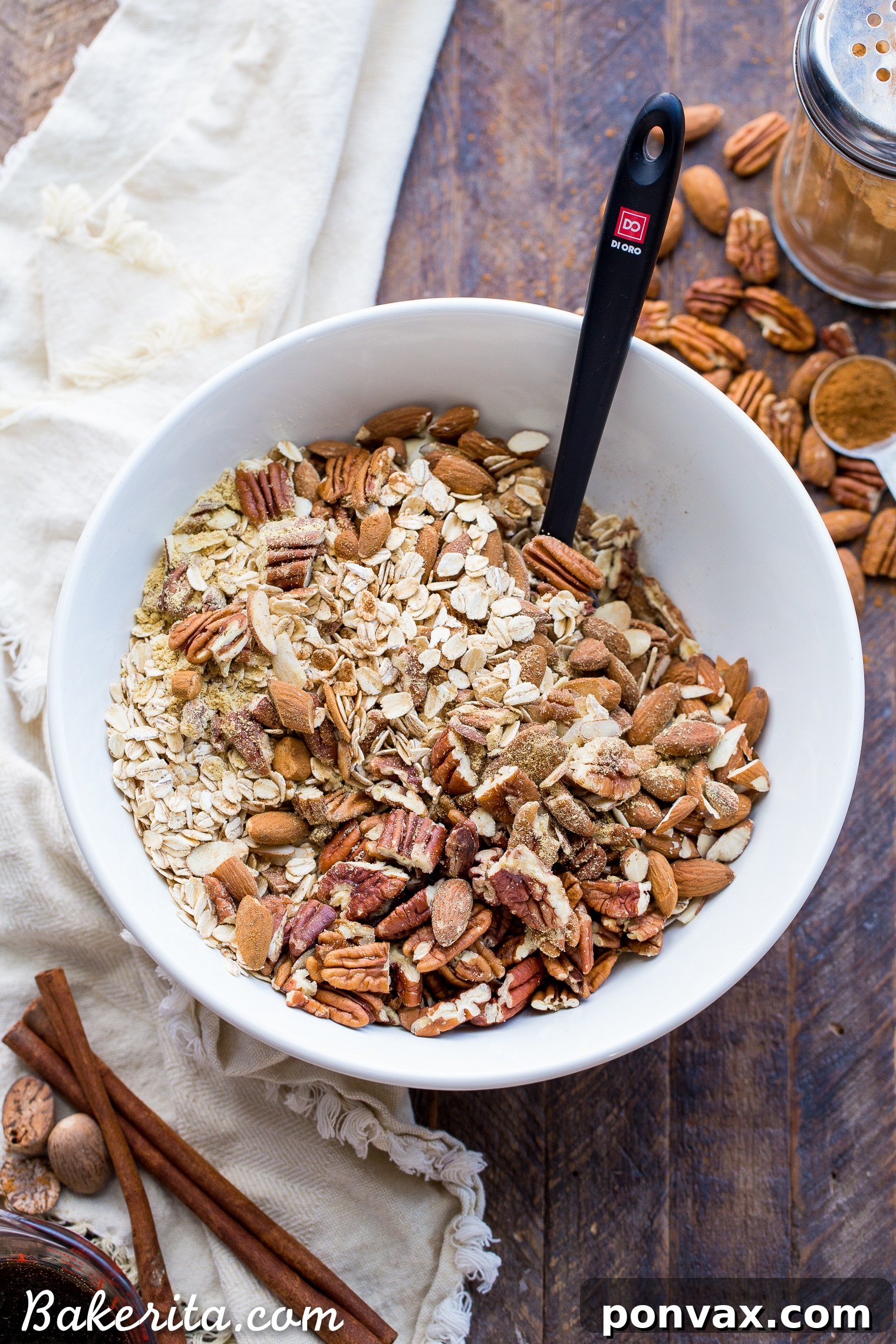 Gingerbread Spice Granola 3 Close-up of golden-brown gingerbread granola clusters, showcasing texture and ingredients.