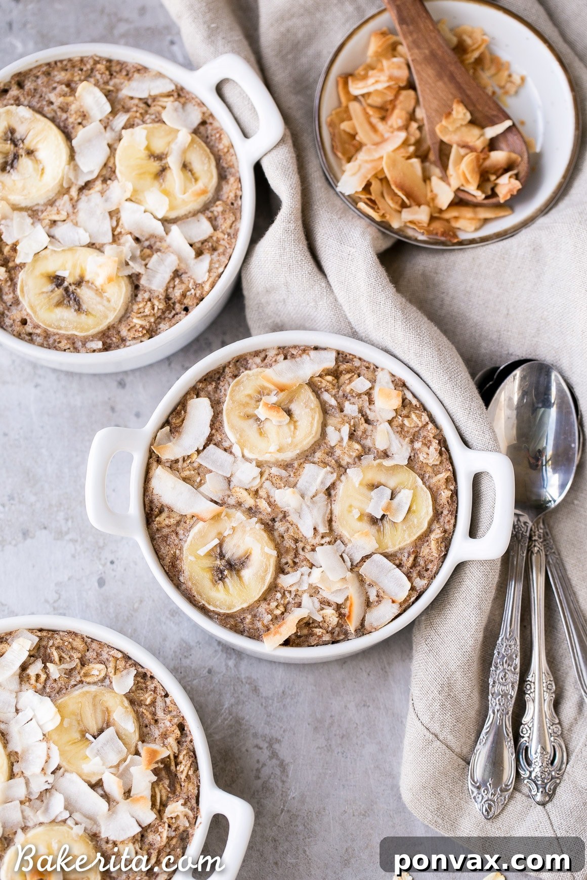 Close-up shot of the baked oatmeal texture, showing the oats and coconut flakes, highlighting its wholesome ingredients and inviting appearance.