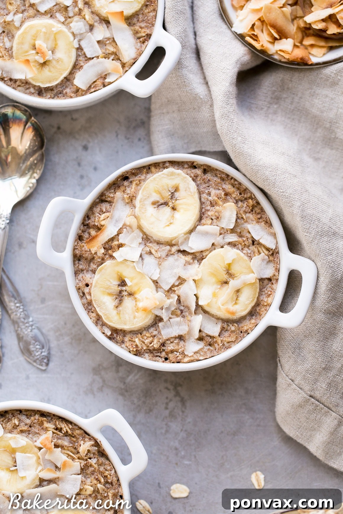 Ingredients for baked oatmeal laid out on a kitchen counter, ready for mixing, emphasizing fresh and whole ingredients.