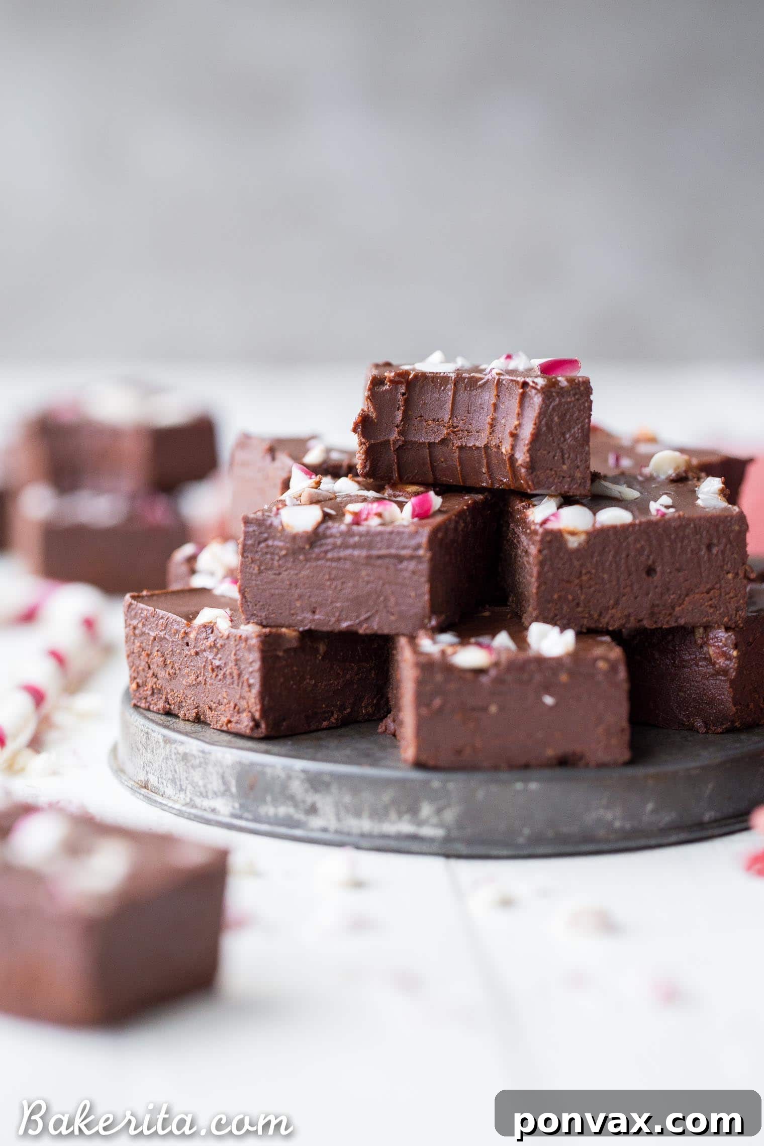 Refreshing Vegan Chocolate Peppermint Fudge 4 Freshly made vegan chocolate peppermint fudge being cut into squares.