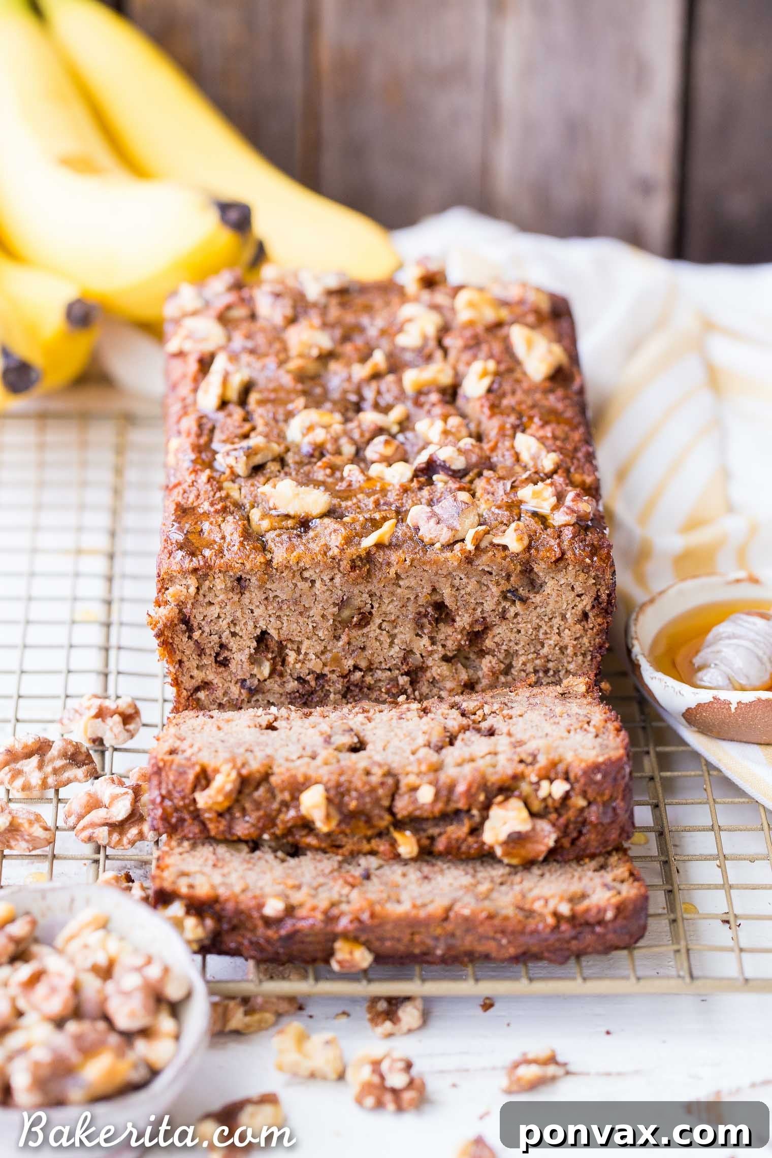 Paleo Golden Honey Nut Banana Loaf 3 Slices of fluffy Paleo Honey Nut Banana Bread with walnuts, a perfect healthy sweet treat.