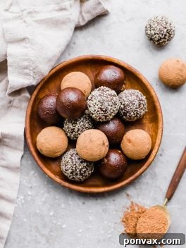 These Raw Chocolate Truffles will satisfy your chocolate candy cravings, guilt-free! These raw, date-sweetened truffles are easy to make in your blender or food processor, and they're gluten-free, paleo, and vegan.