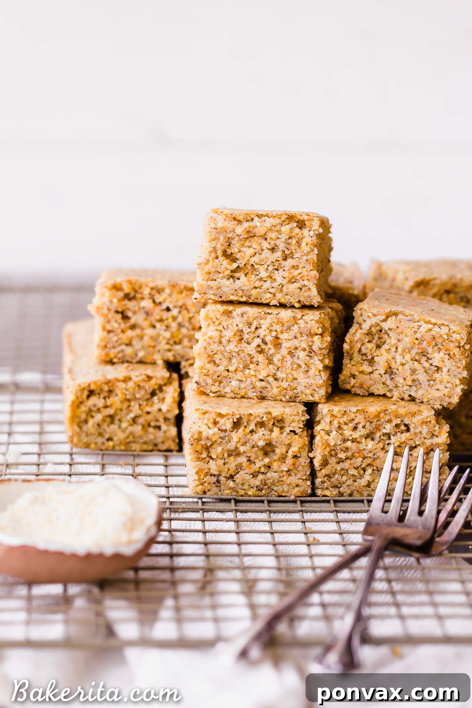 This Gluten Free + Vegan Cornbread is fluffy and light with an amazing texture from the cornmeal! It's perfect served with soup or chili, served as a side or snack, or just topped with a little bit of butter or spread.