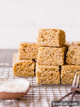 This Gluten Free + Vegan Cornbread is fluffy and light with an amazing texture from the cornmeal! It's perfect served with soup or chili, served as a side or snack, or just topped with a little bit of butter or spread.