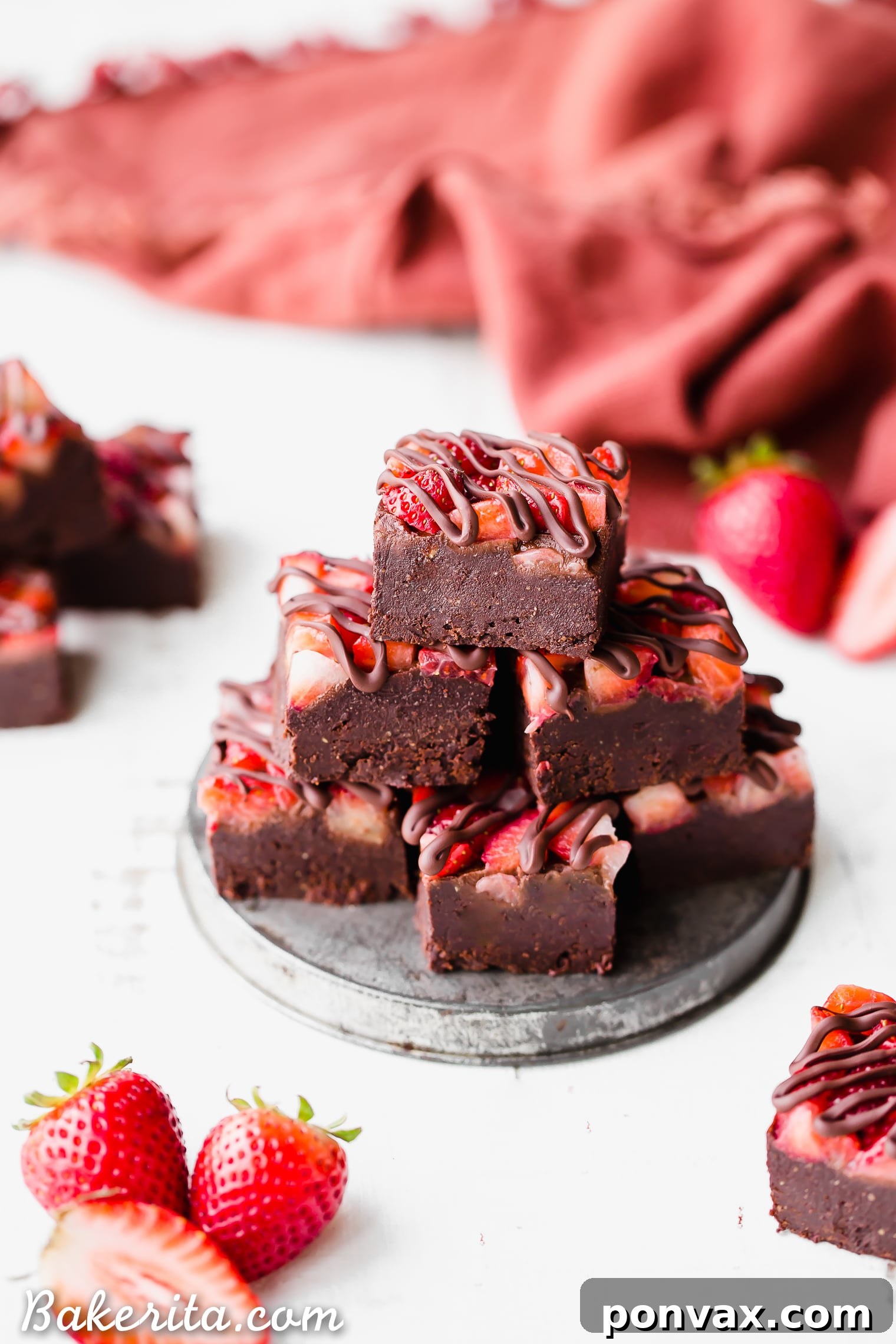 Decadent Chocolate Strawberry Fudge, a simple five-ingredient, no-bake recipe that tastes like chocolate-covered strawberries. Gluten-free, paleo, and vegan friendly.