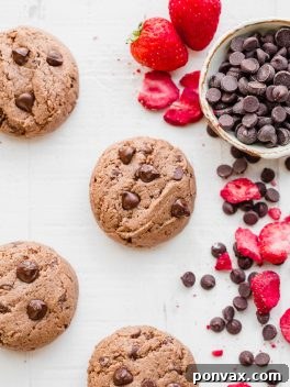 Thick and rich Flourless Strawberry Chocolate Chip Cookies, gluten-free, paleo, and vegan, made with just six ingredients.
