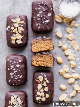 These Dark Chocolate Peanut Butter Truffle Bars are easy to make and SO delicious - these are the perfect healthier candy bar! They're gluten-free and grain-free with a vegan option.