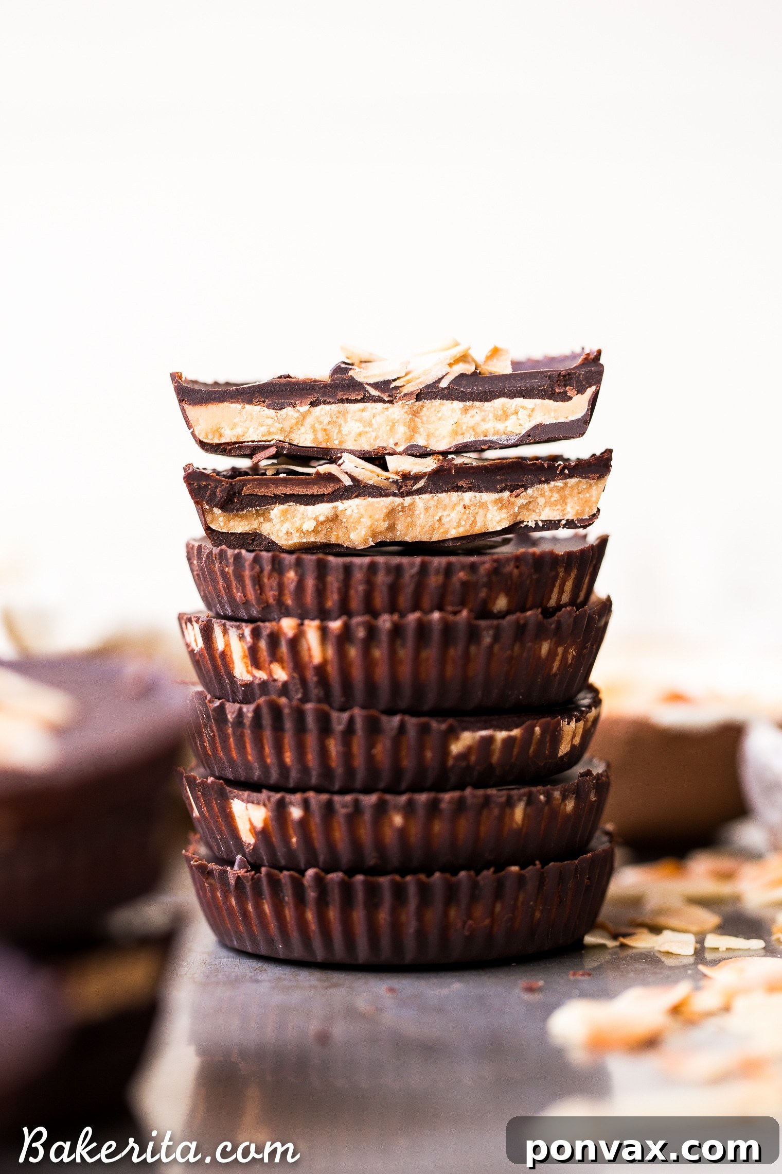 These Toasted Coconut Butter Cups are made with just four simple ingredients! Toasted coconut butter is the star of the show, encased in decadent homemade chocolate for a healthy homemade candy that will satisfy your sweet tooth. You're going to love these paleo + vegan coconut butter cups.