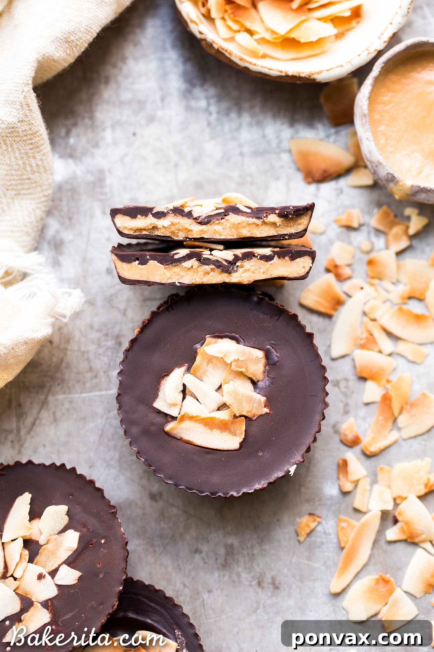 These Toasted Coconut Butter Cups are made with just four simple ingredients! Toasted coconut butter is the star of the show, encased in decadent homemade chocolate for a healthy homemade candy that will satisfy your sweet tooth. You're going to love these paleo + vegan coconut butter cups.
