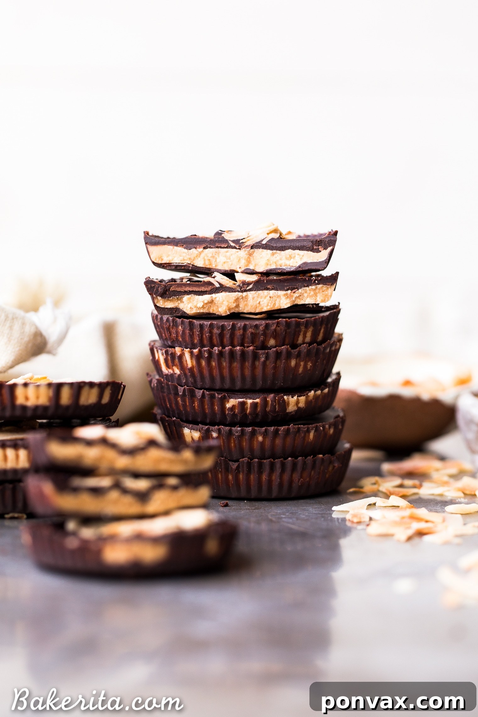These Toasted Coconut Butter Cups are made with just four simple ingredients! Toasted coconut butter is the star of the show, encased in decadent homemade chocolate for a healthy homemade candy that will satisfy your sweet tooth. You're going to love these paleo + vegan coconut butter cups.