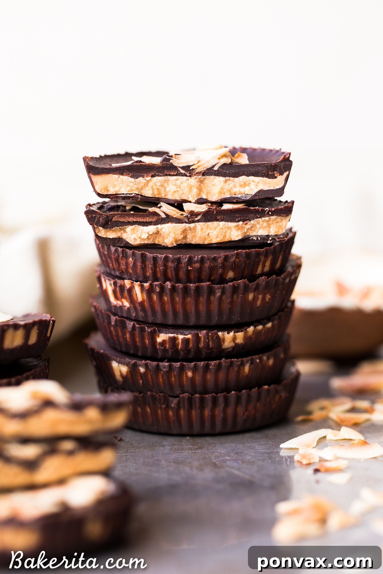 These Toasted Coconut Butter Cups are made with just four simple ingredients! Toasted coconut butter is the star of the show, encased in decadent homemade chocolate for a healthy homemade candy that will satisfy your sweet tooth. You're going to love these paleo + vegan coconut butter cups.
