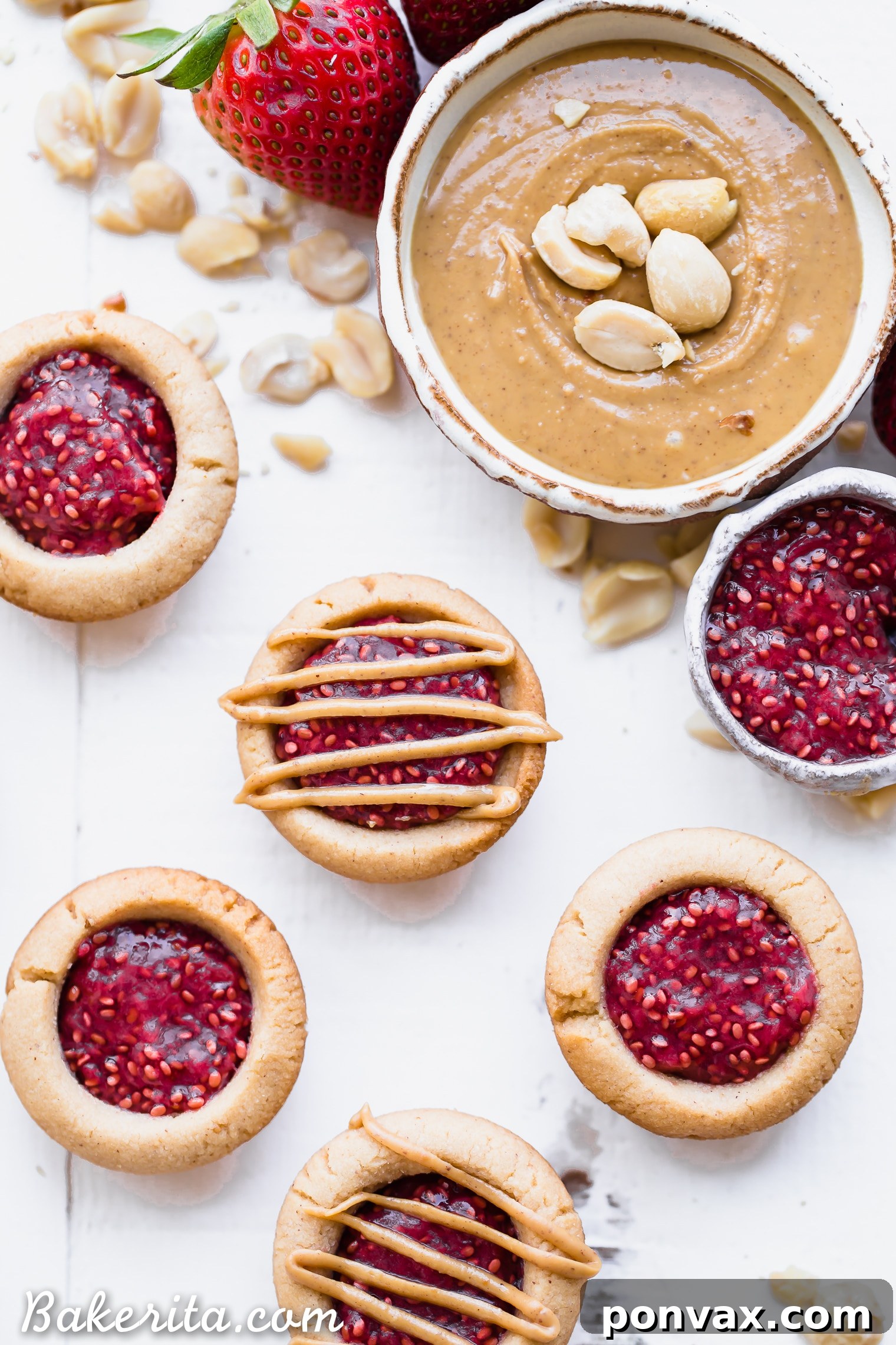 Finished Peanut Butter & Jelly Tartlets, drizzled with extra peanut butter.