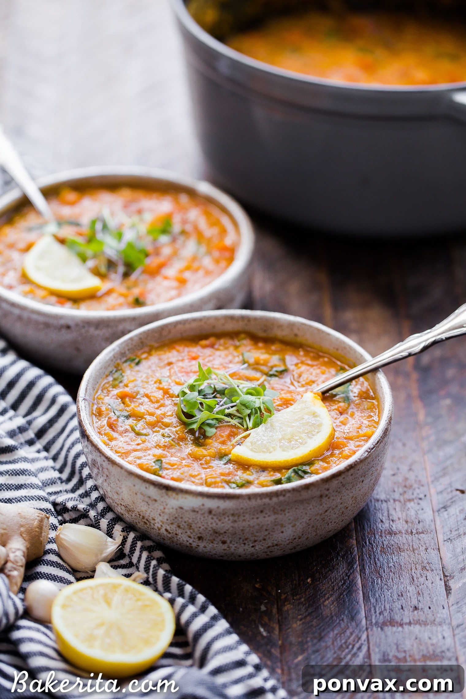 Creamy Vegan Red Lentil Delight 5 A cook stirring a large pot of Vegan Red Lentil Soup, illustrating the hands-on process of making this easy and healthy meal.