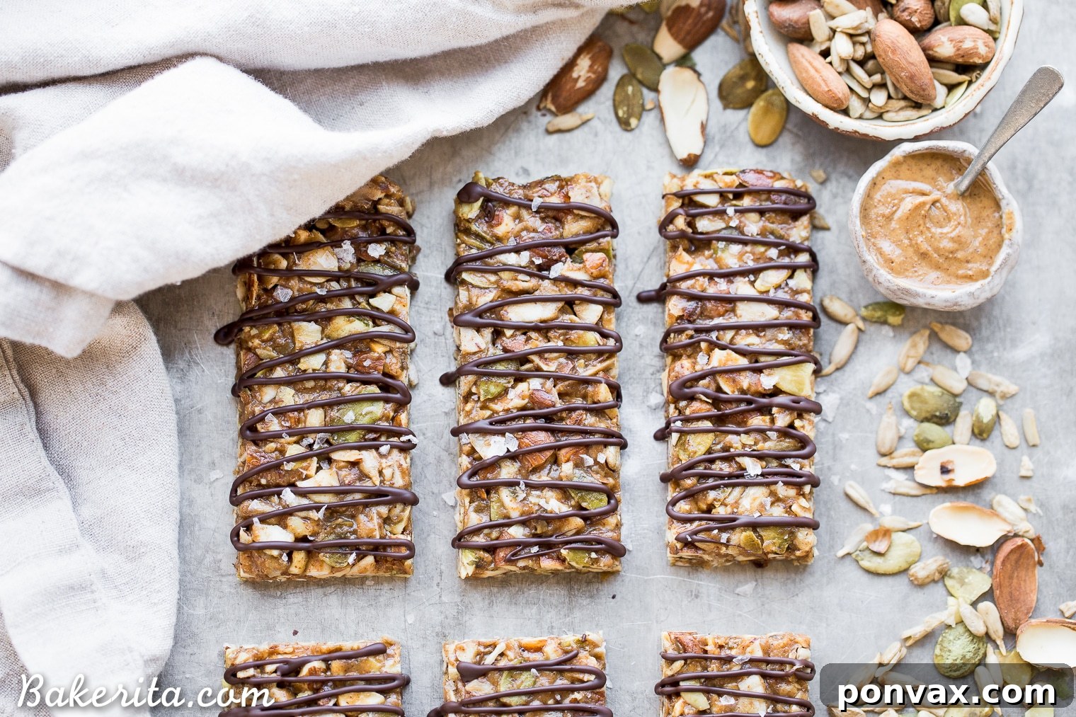 Activated Wholesome Nut Seed Bars 4 A single No-Bake Sprouted Nut & Seed Granola Bar bitten into, revealing its dense, chewy interior with visible nuts and seeds.