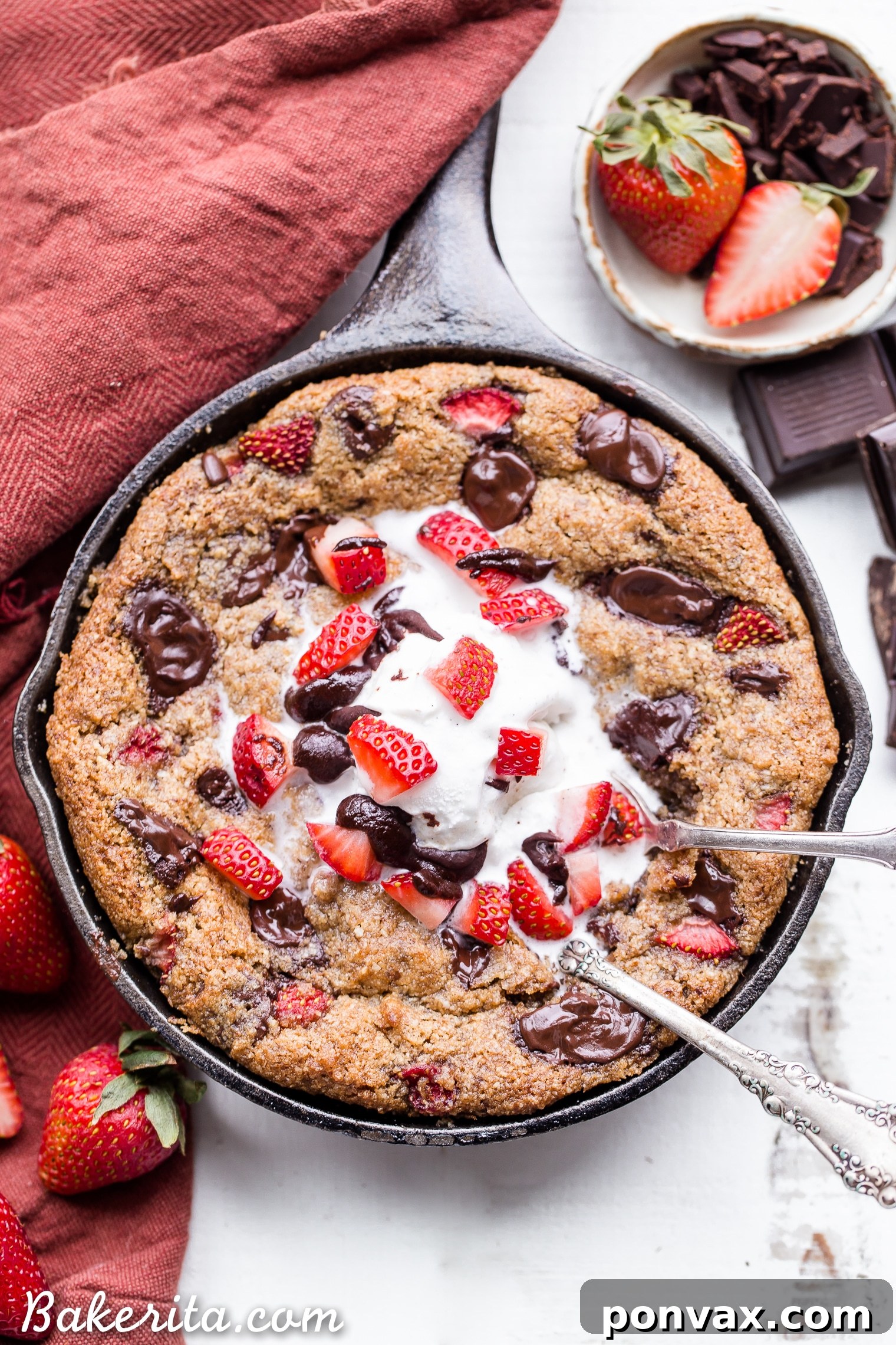Decadent Gluten-Free Strawberry Chocolate Skillet Cookie 6 This Strawberry Chocolate Chunk Skillet Cookie is gooey in the middle, with crispy edges and all the flavors you love in a chocolate covered strawberry! This gluten-free, paleo and vegan skillet cookie will satisfy all your cravings - the fresh strawberries are the perfect fruity addition to this rich, chocolatey treat!