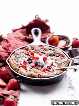 Decadent Gluten-Free Strawberry Chocolate Skillet Cookie 7 This Strawberry Chocolate Chunk Skillet Cookie is gooey in the middle, with crispy edges and all the flavors you love in a chocolate covered strawberry! This gluten-free, paleo and vegan skillet cookie will satisfy all your cravings - the fresh strawberries are the perfect fruity addition to this rich, chocolatey treat!