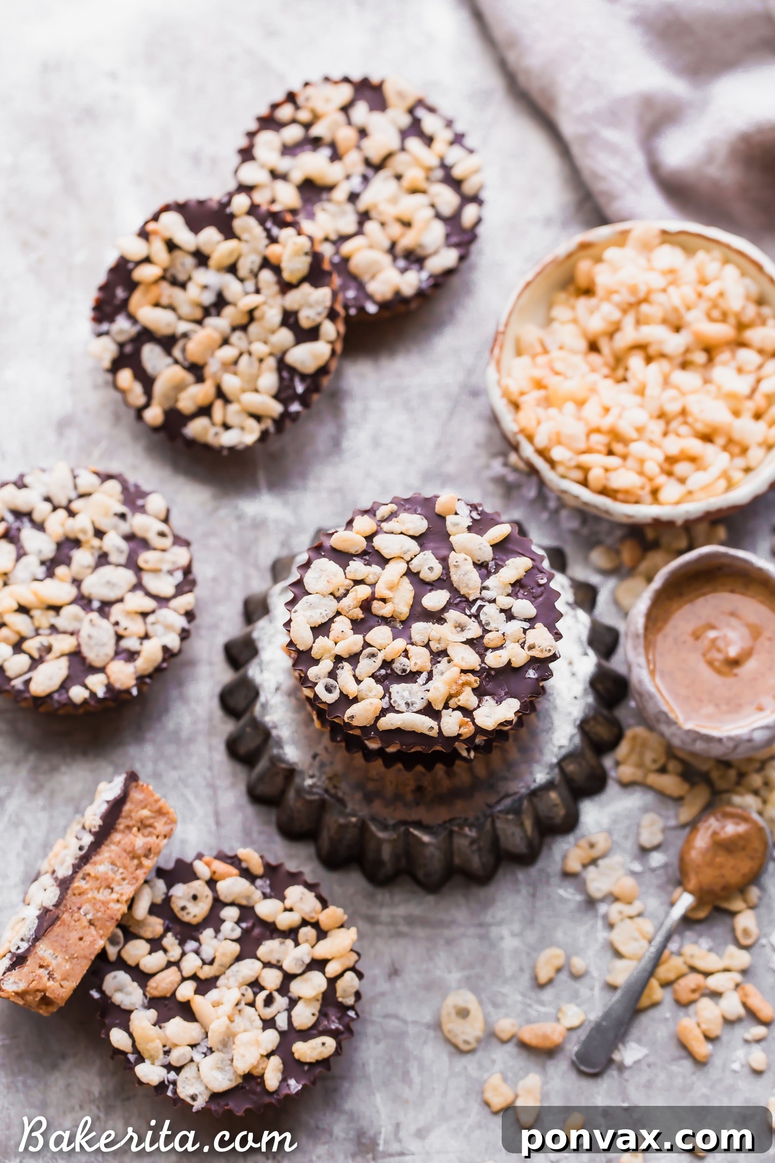 Decadent Crispy Chocolate Almond Butter Bites Vegan Gluten Free 3 Close-up of a stack of No-Bake Crispy Chocolate Almond Butter Cups showcasing their rich layers.