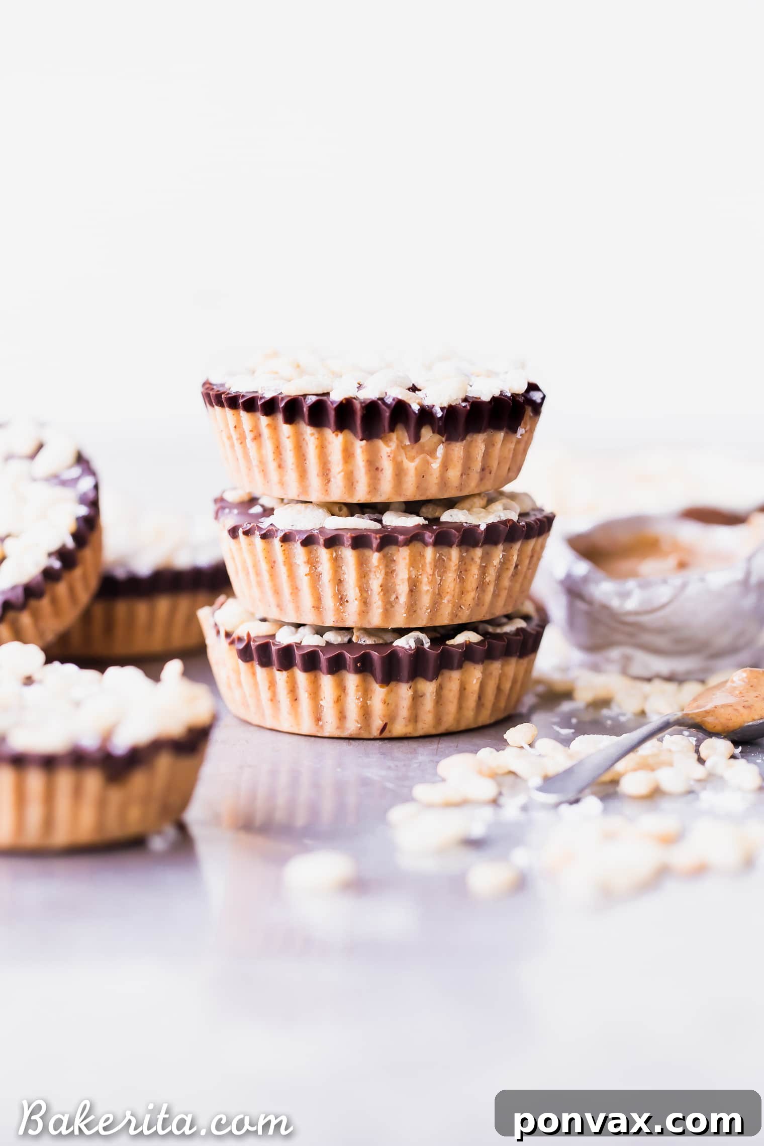 Decadent Crispy Chocolate Almond Butter Bites Vegan Gluten Free 5 Close-up of Crispy Chocolate Almond Butter Cup with a perfect bite taken out, showing the layers.