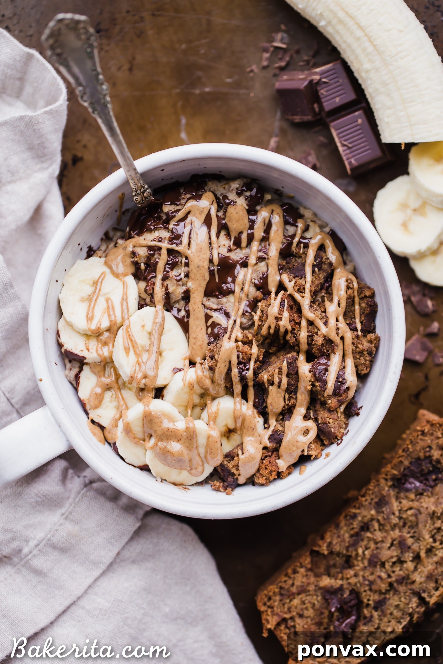 A warm bowl of homemade Banana Bread Oatmeal, topped with banana slices and a sprinkle of cinnamon.
