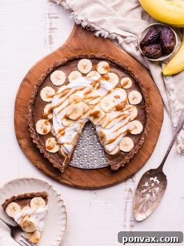 This No Bake Banana Caramel Tart is similar to a classic Banoffee pie, but there's no baking necessary and it's sweetened entirely with dates! This healthy twist on a classic is sweet and scrumptious with a date caramel filling and coconut whipped cream on top. It's gluten-free, paleo, and vegan.