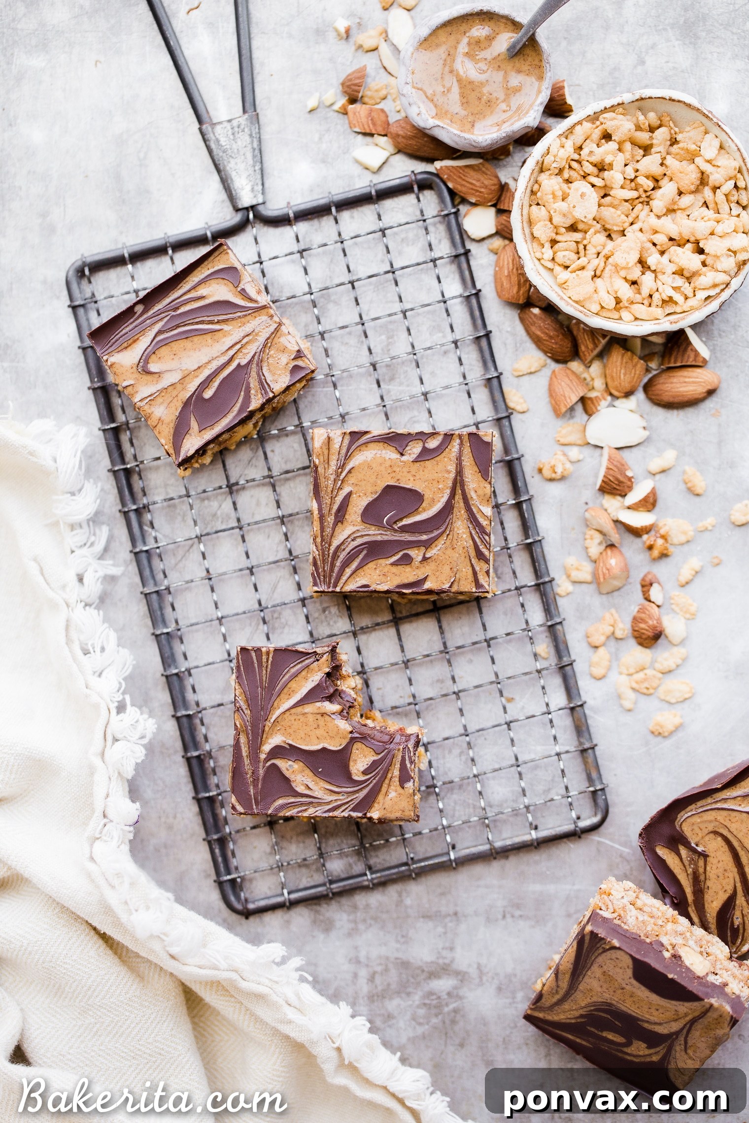 Guilt Free Crispy Chocolate Almond Butter Bars 2 Deliciously layered Chocolate Almond Butter Crispy Bars, showcasing the chocolate swirl and crispy base.