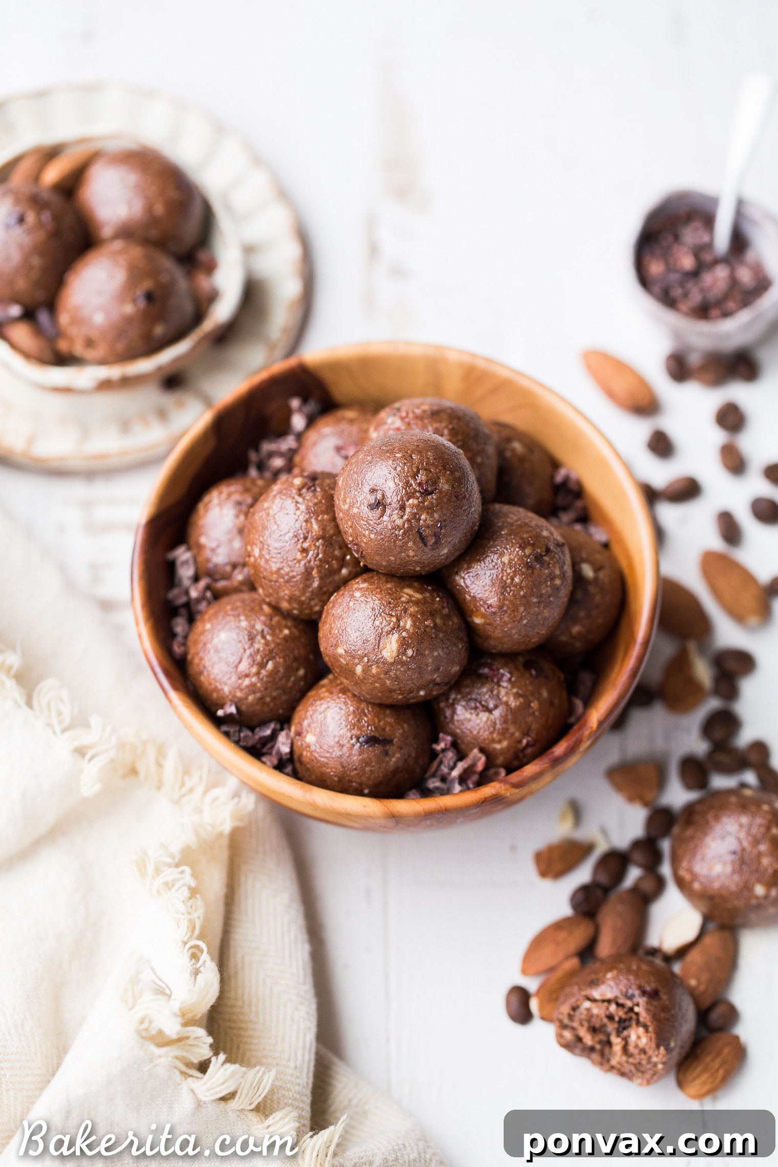 Keto Vegan Paleo Gluten Free Mocha Almond Fat Balls 4 Several Mocha Almond Fat Balls arranged artistically, emphasizing their rich color and texture, suitable for a healthy lifestyle. This whole30 and keto-friendly treat offers energy and flavor.