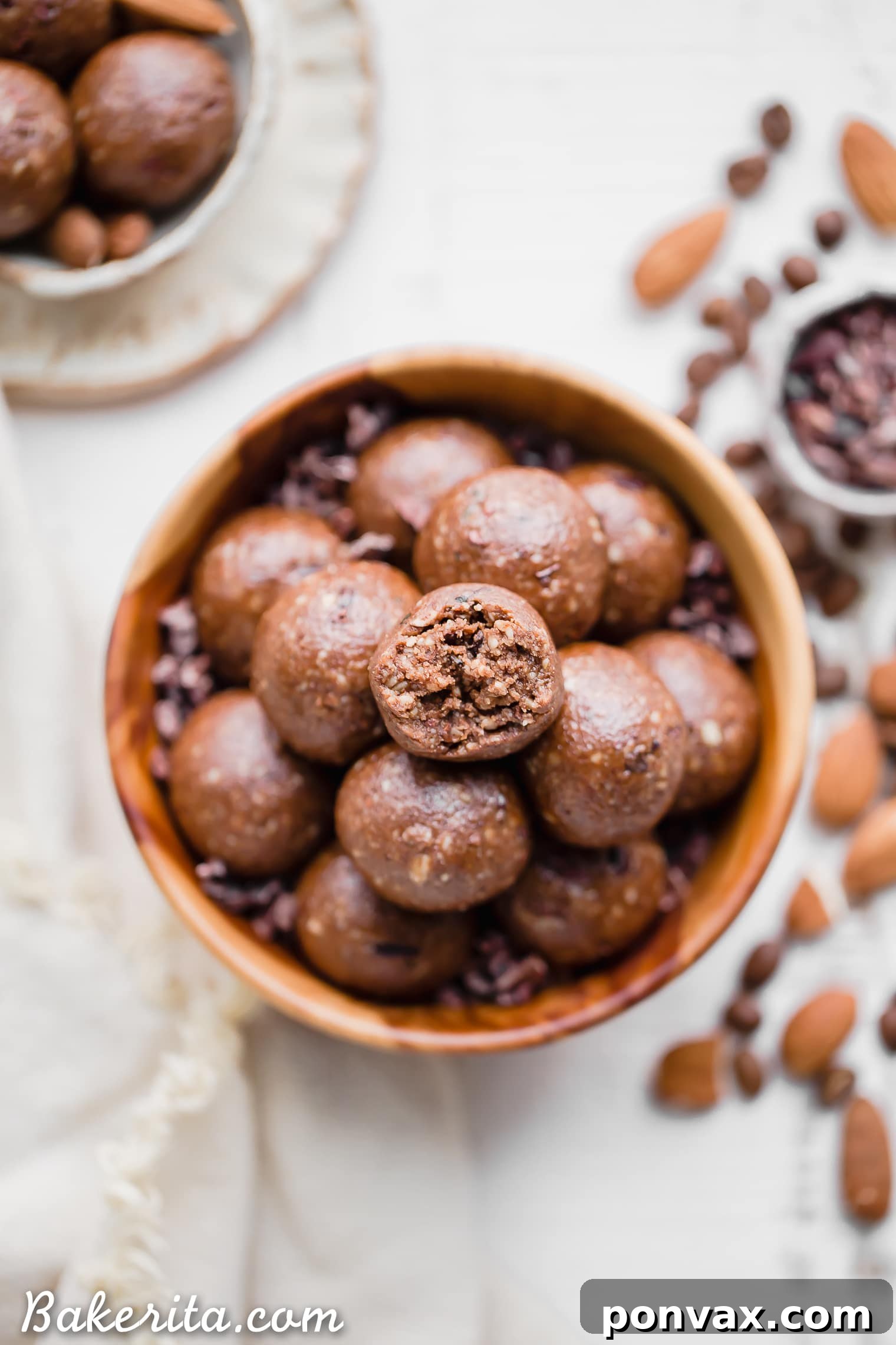 Keto Vegan Paleo Gluten Free Mocha Almond Fat Balls 6 A single Mocha Almond Fat Ball placed delicately on a surface, highlighting its artisanal quality and compact design for healthy snacking on the go. Perfect for those adhering to gluten-free, paleo, vegan, or keto diets.
