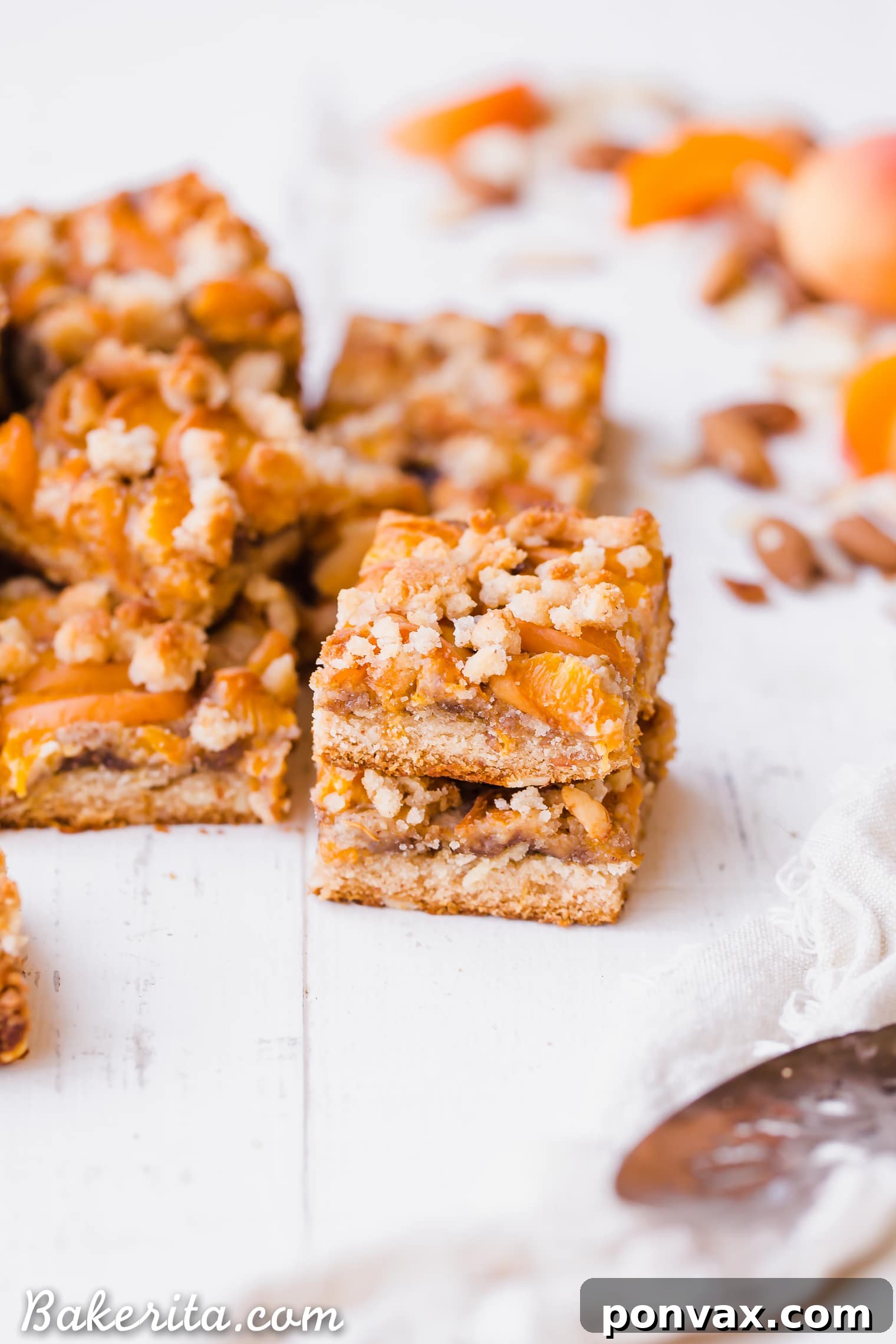 A baking pan filled with freshly baked Apricot Frangipane Bars, ready to be cut.