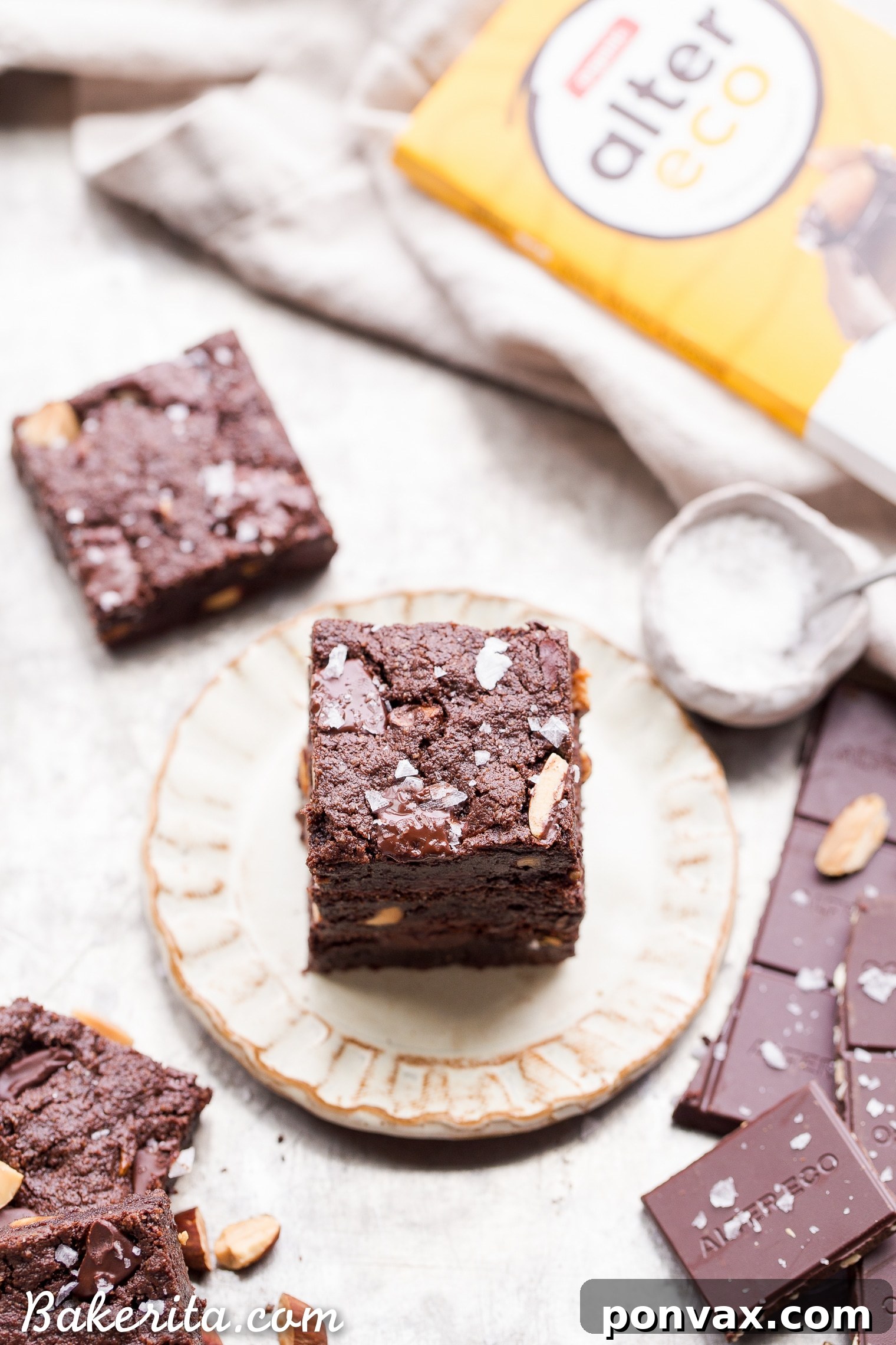 These super fudgy Salted Almond Brownies are gluten-free, paleo, and vegan, offering an incredibly chocolatey experience with toasted almonds and sea salt for an elevated taste, comparable to traditional brownies.