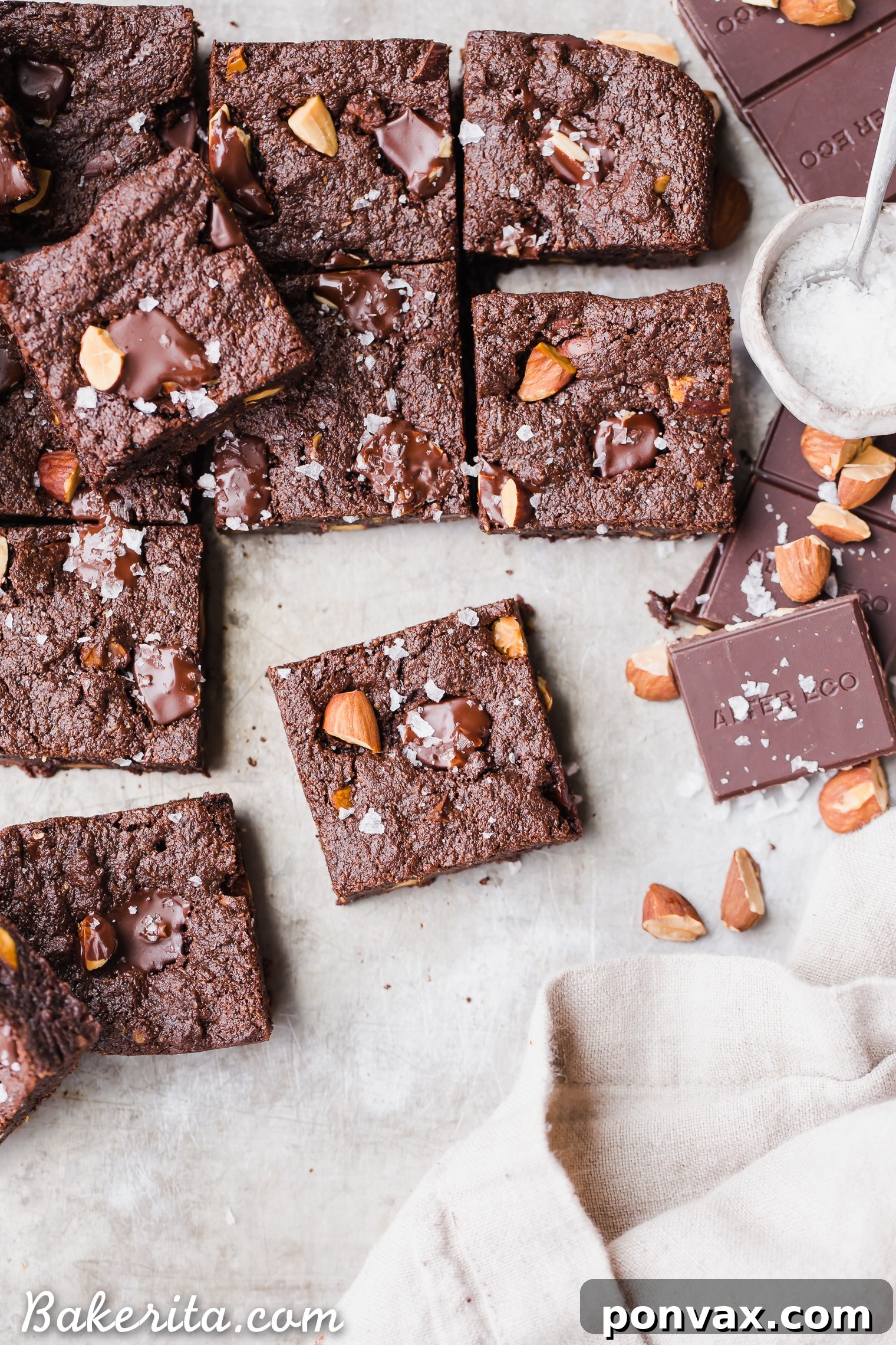 Super fudgy Salted Almond Brownies that are gluten-free, paleo, and vegan, crafted to taste just as good as traditional brownies, featuring rich chocolate, toasted almonds, and sea salt.