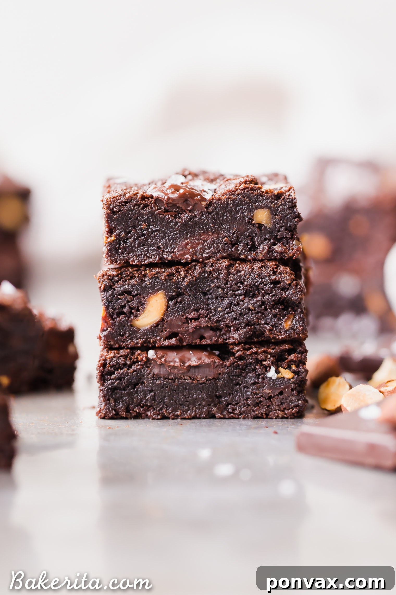 These super fudgy Salted Almond Brownies are gluten-free, paleo, and vegan. Their rich chocolate, toasted almonds, and sea salt create a flavor profile as satisfying as traditional brownies.