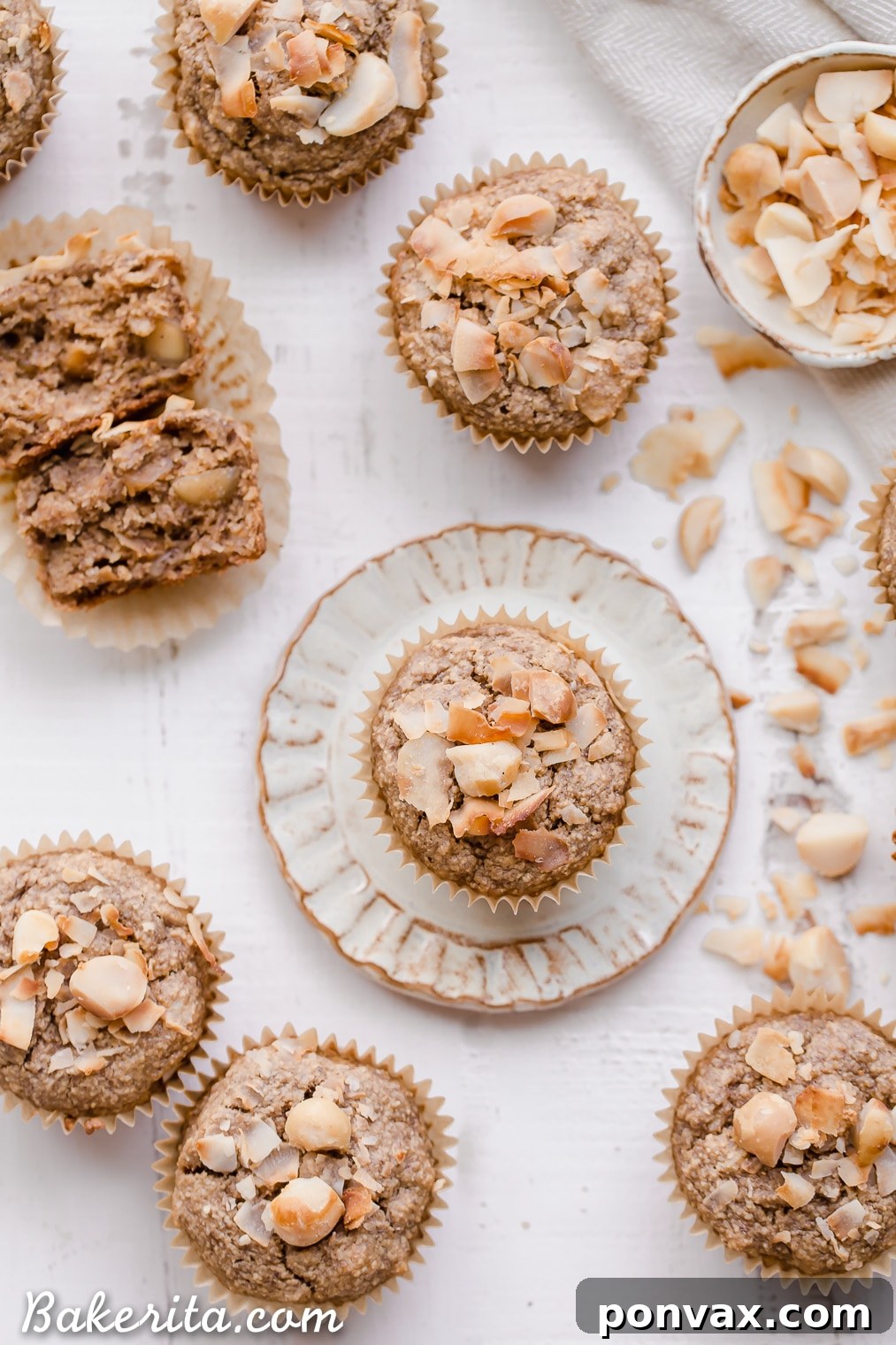 Wholesome Macadamia Nut Coconut Banana Muffins Vegan Gluten Free 3 A stack of three warm Macadamia Nut Coconut Banana Muffins, featuring their inviting textures and golden hue. The top muffin is slightly tilted, revealing its fluffy interior, while the backdrop hints at a cozy kitchen setting.