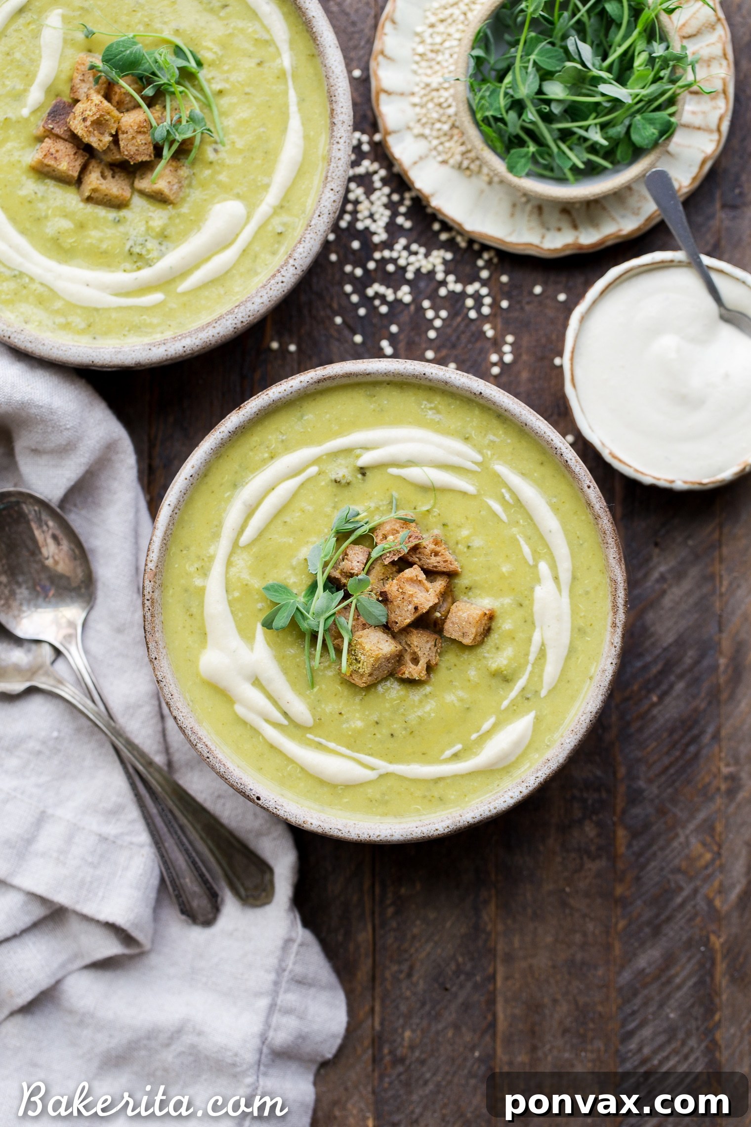 This Creamy Broccoli Quinoa Soup is thickened with cashews and swirled with an easy cashew cream sauce. It's rich and filling thanks to the quinoa and cashews and bright from a squeeze of fresh lemon juice. You'll love this gluten-free and vegan soup on these chillier days!