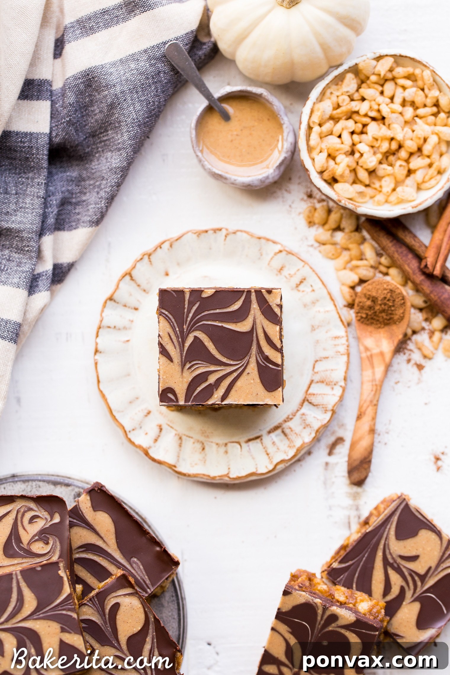 These Chocolate Pumpkin Spice Crispy Bars have a pumpkin spice rice crispy base, topped with a layer of dark chocolate and a pumpkin spice swirl. These bars are easy to make, beautiful, delicious, and gluten-free + vegan!