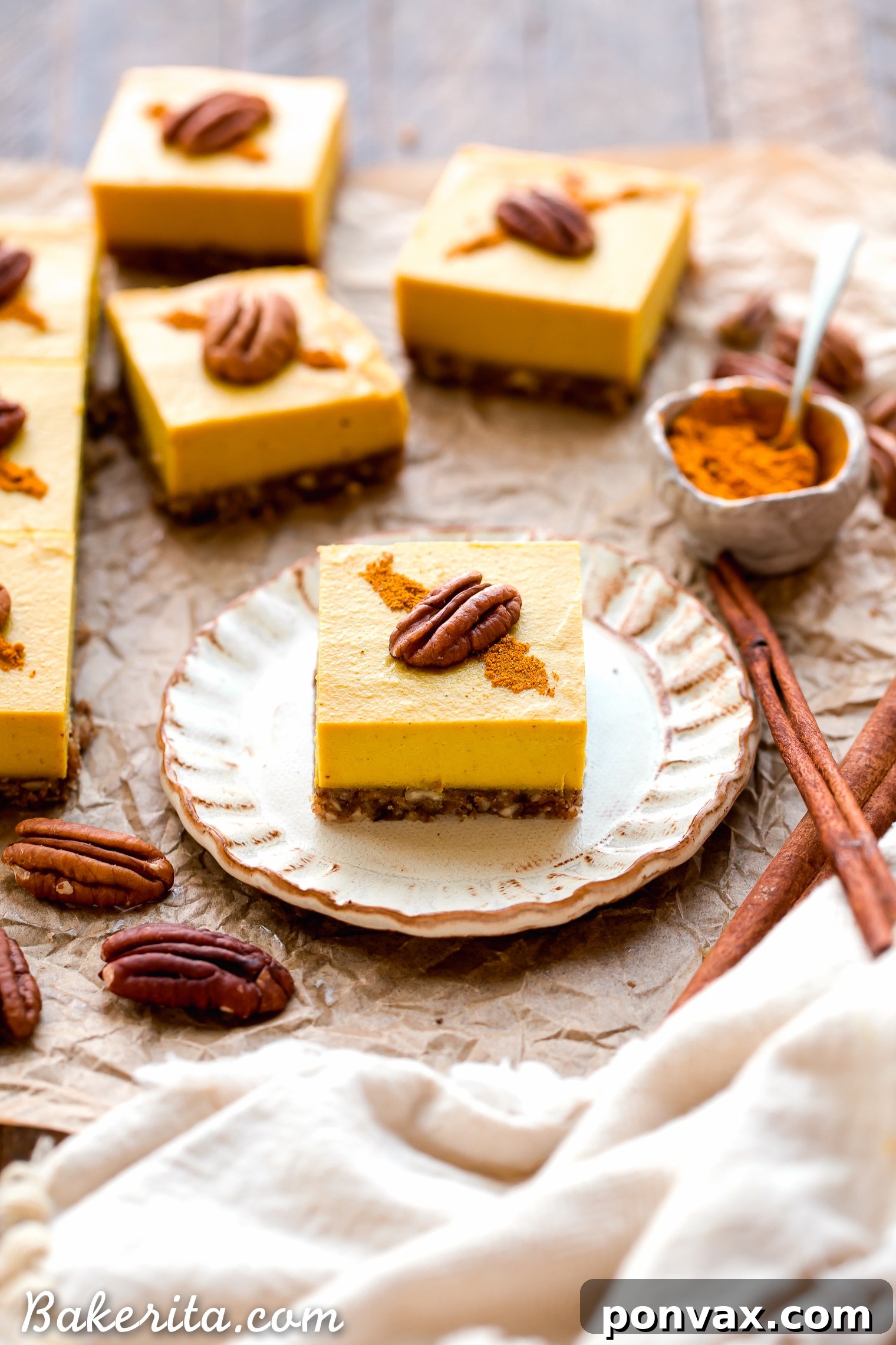 These No Bake Golden Milk Cheesecake Bars are a dessert that's loaded with the anti-inflammatory benefits of turmeric and the warmth and comfort of golden milk. They're deliciously spiced, gluten-free, paleo, vegan, and perfect for sharing.