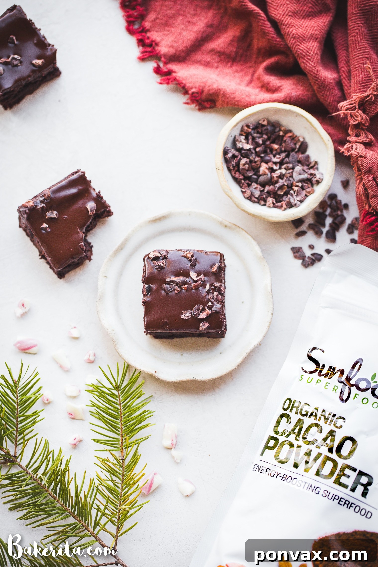 Close-up of a Peppermint Brownie square, showing the dense chocolate interior and ganache.