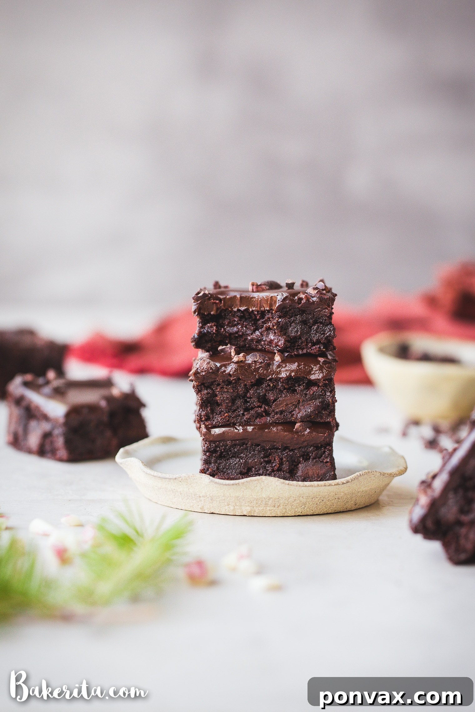 Freshly baked peppermint brownies cooling on a rack, ready for ganache.