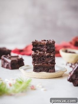 Rich and fudgy Peppermint Brownies with luscious dark chocolate ganache.