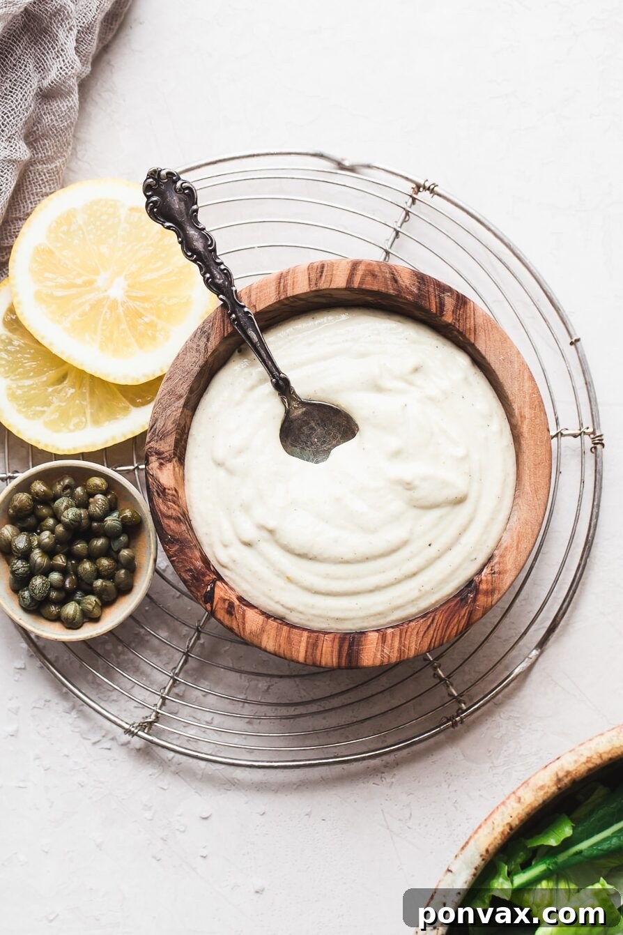 Creamy Vegan Caesar Dressing made with cashews, perfect for salads, dips, and sandwiches.