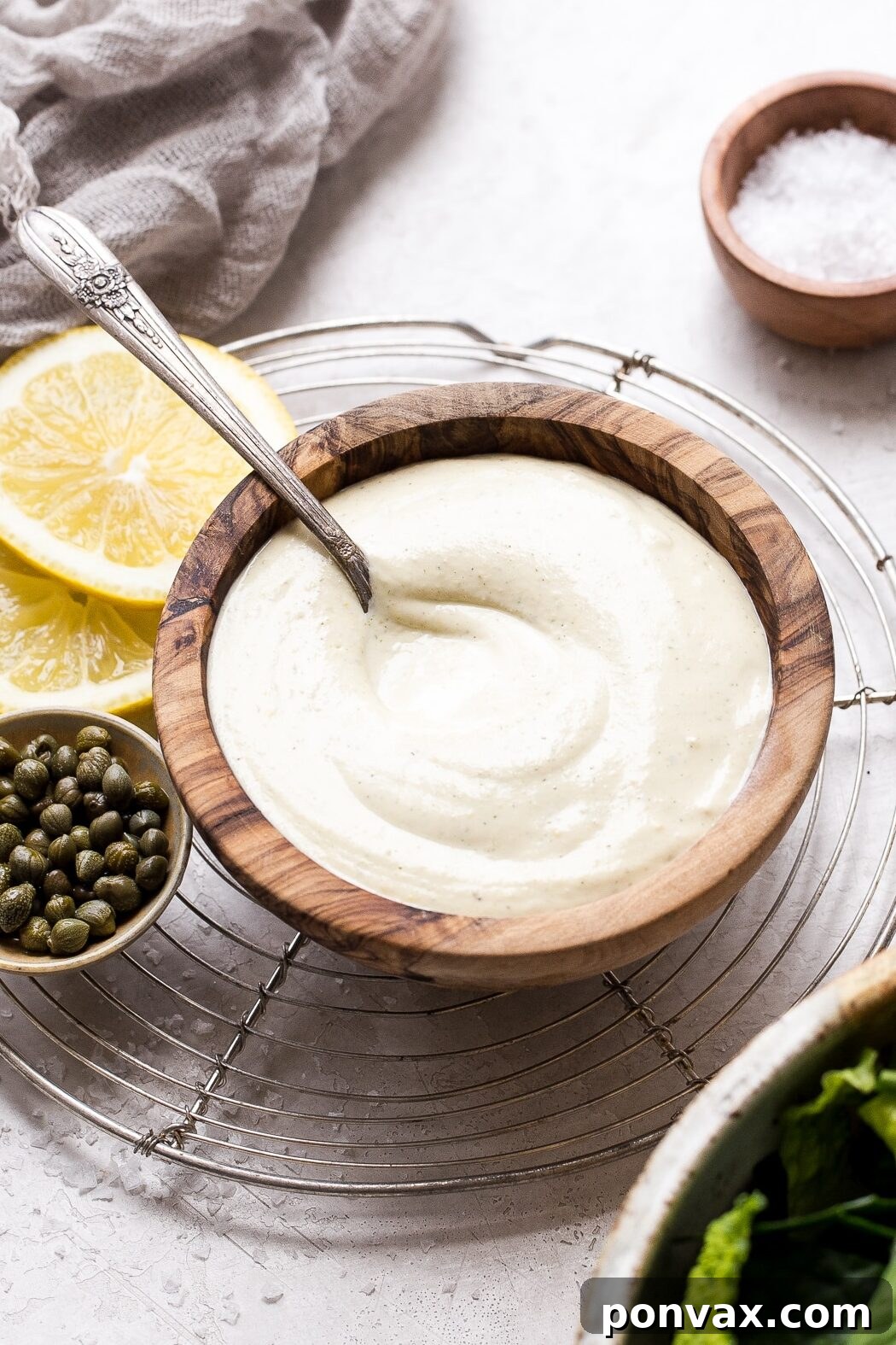 Vegan Caesar Dressing in a small bowl, perfect for dipping vegetables or spreading on wraps.