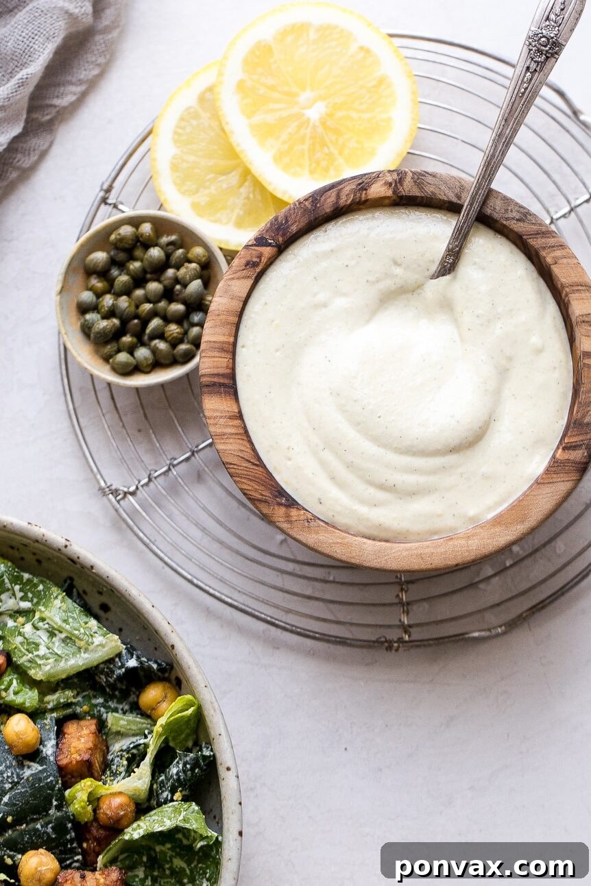 Close-up of Vegan Caesar Dressing ingredients, including cashews, lemon, and garlic.