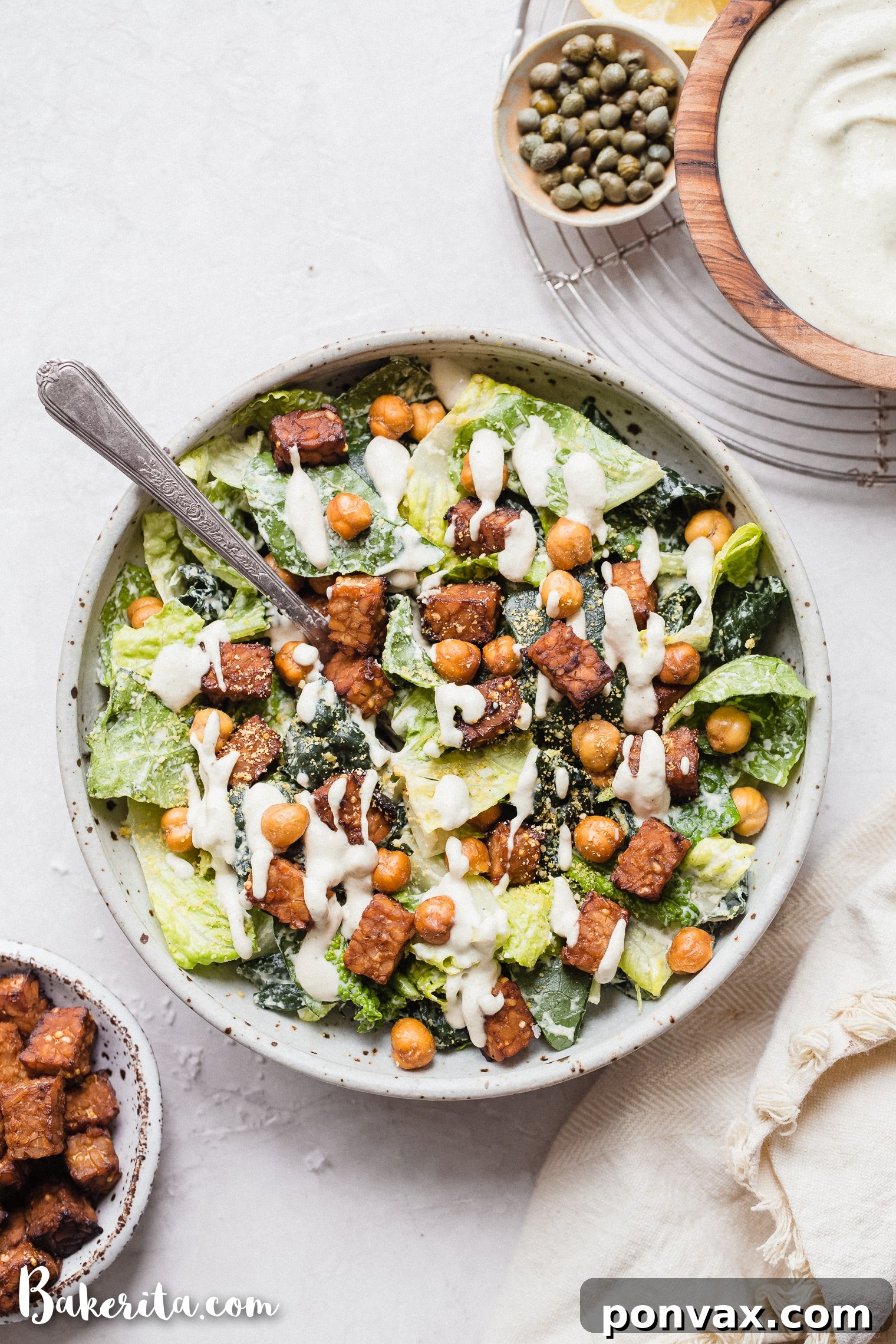 Serve this Vegan Caesar Salad with Crispy Tempeh & Crunchy Chickpeas for lunch or dinner - it's delicious anytime! The crispy marined tempeh is incredibly flavorful and filling and the chickpeas add lots of crunch. 