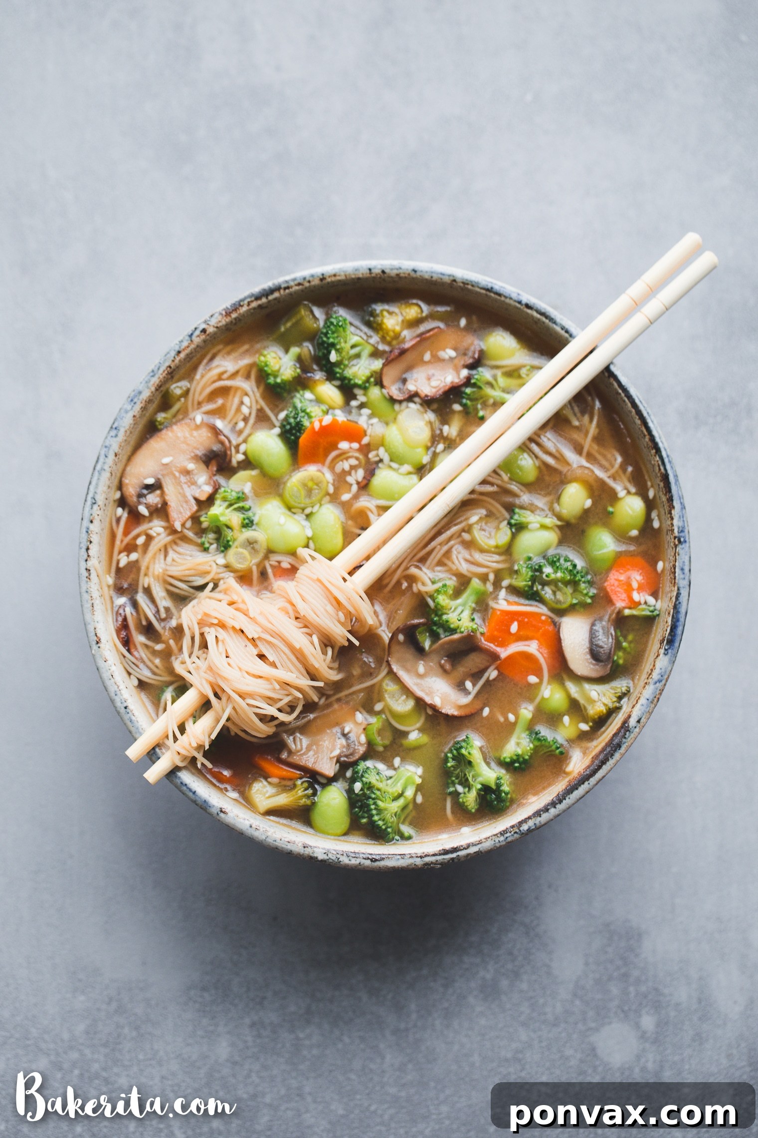 Soulful Miso Veggie Noodle Bowl 4 Overhead shot of Vegetable Noodle Miso Soup ingredients laid out, including fresh ginger, garlic, green onions, various vegetables, miso paste, and rice noodles.