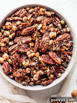 Sesame Tamari Pecan Snack Mix in a bowl, a gluten-free and vegan delight.