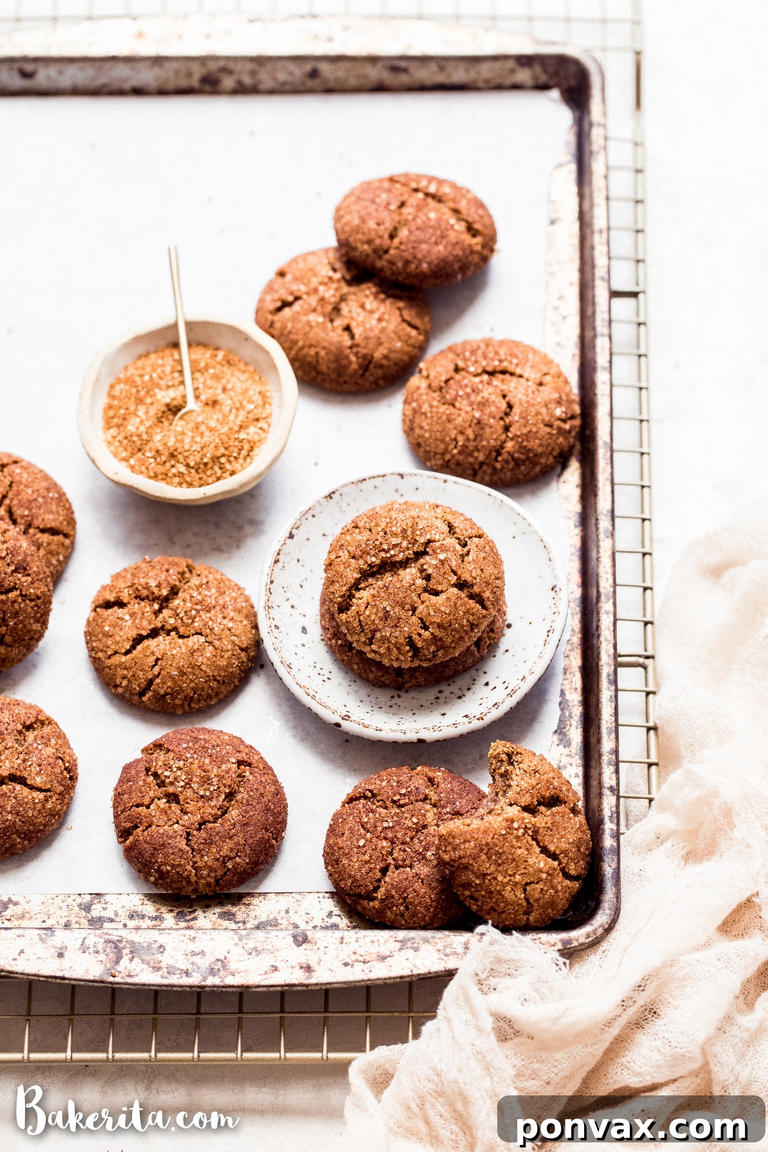 Scoops of gluten-free vegan snickerdoodle dough ready to be rolled in cinnamon sugar.