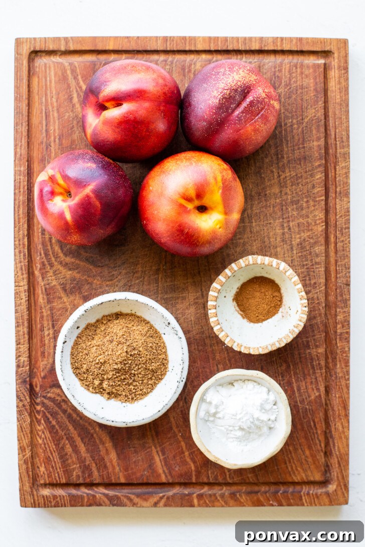 Freshly baked Gluten-Free Vegan Peach Crisp, golden brown and bubbling, ready to be served.